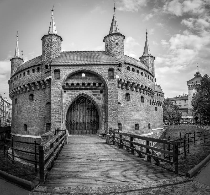 CRACOW, POLAND - MAY 02, 2015: black and white photo of Barbakan fortress in Cracow ( Krakow ), Poland. CRACOW, POLAND - MAY 02, 2015: black and white photo of Barbakan fortress in Cracow ( Krakow ), Poland