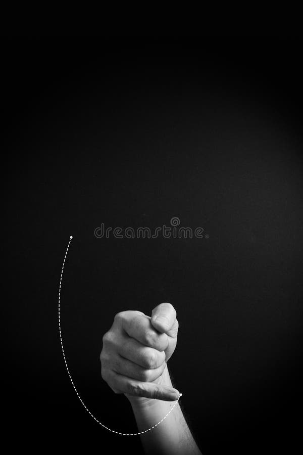 B&W image of hand demonstrating ASL sign language letter J with empty copy space stock photo