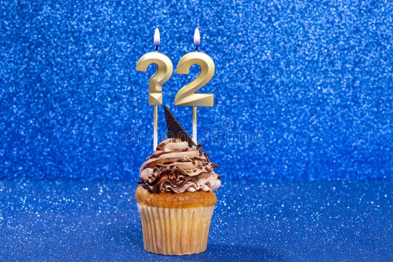 Cupcake With Number For Celebration Of Birthday Or Anniversary Question Mark And 2. Cupcake With Number For Celebration Of Birthday Or Anniversary Question Mark And 2