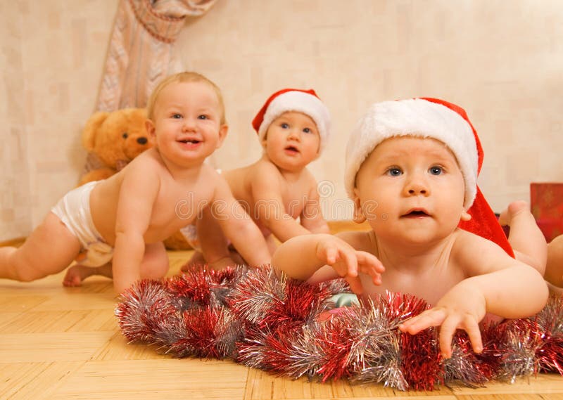 Babies in Christmas hats