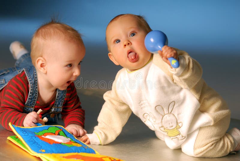 Babies with toys