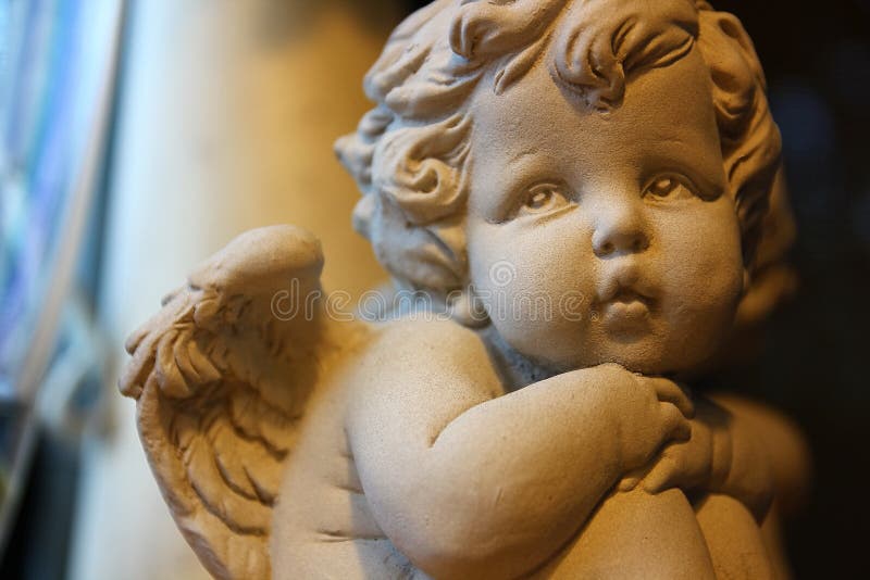 The Baby Angle or Cherub Sand Statue with Innocent Eyes Stock Photo Image of child, cemetery
