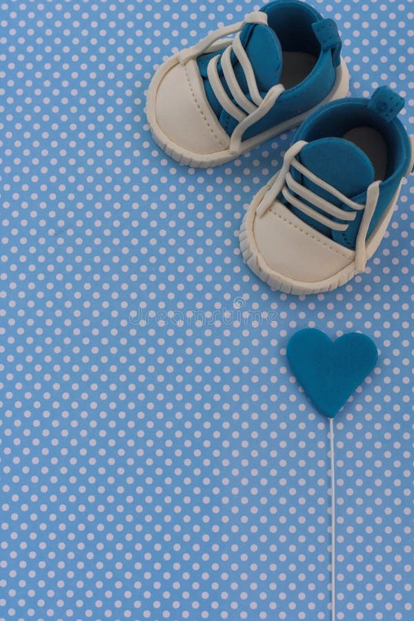Baby boy blue card.Kids background. Baby shower invitation.Baby announcement. Fondant baby accesories. Welcome baby boy. Baby boy blue card.Kids background. Baby shower invitation.Baby announcement. Fondant baby accesories. Welcome baby boy
