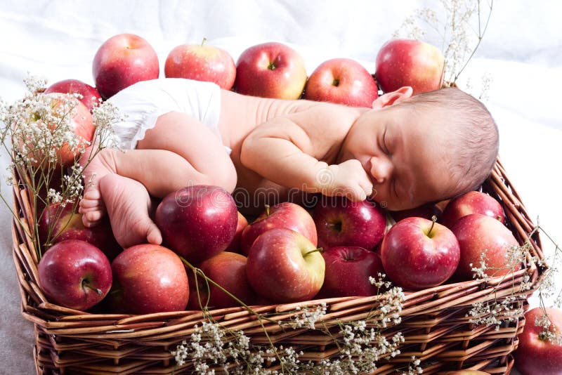 Baby in apples stock image. Image of little, basket, caucasian 8722131