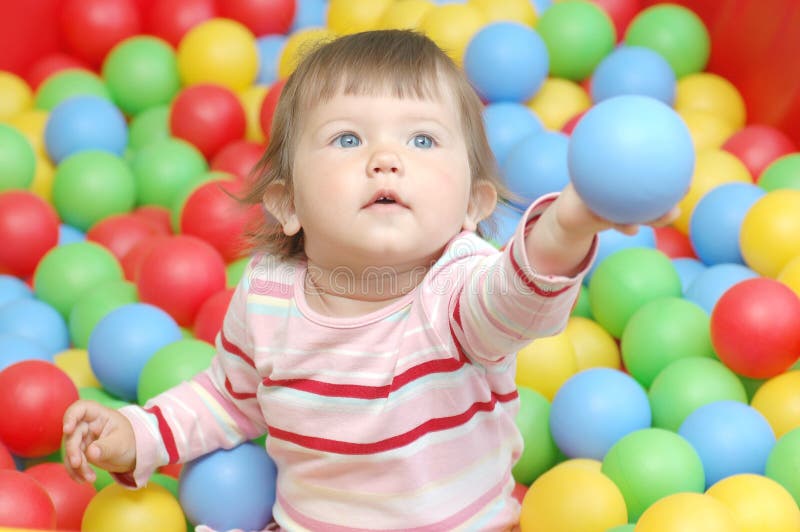 Baby with balls stock image. Image of beauty, infant 11083413