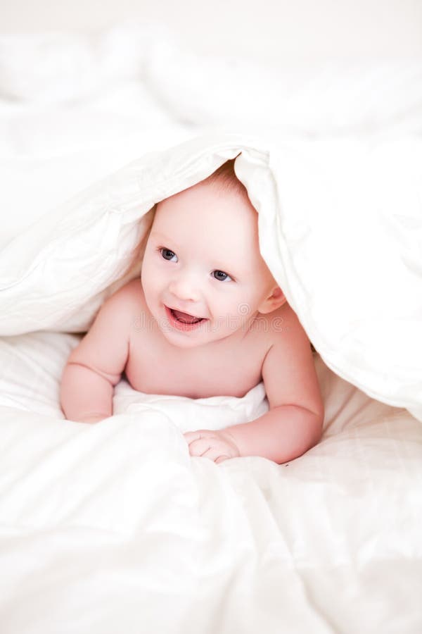 Baby in a Blanket stock image. Image of baby, smiling 57917405