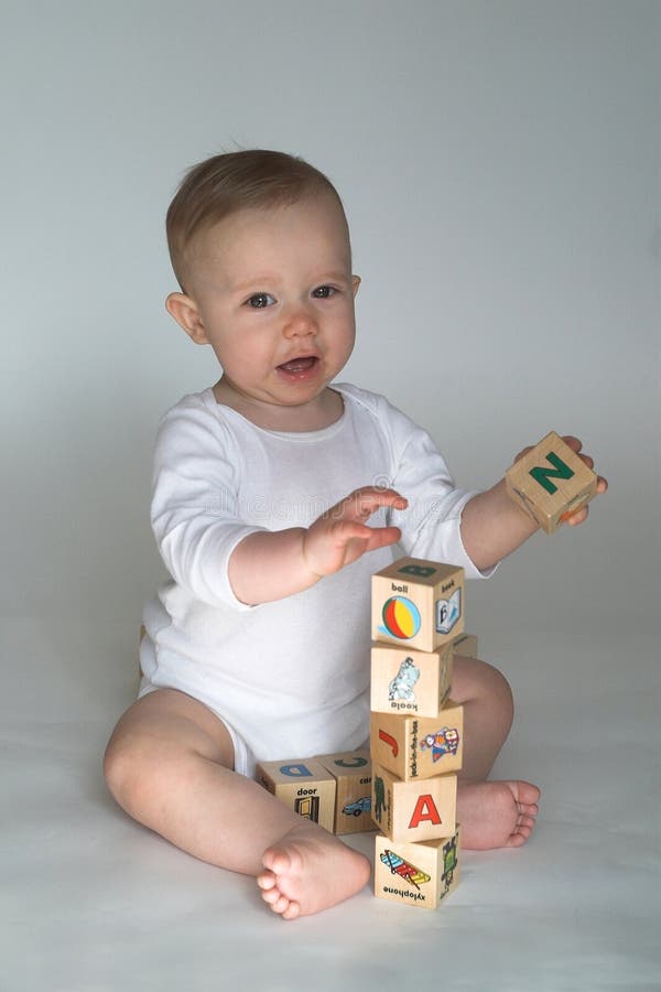Baby Blocks stock photo. Image of barefoot, handsome, happy 2453374