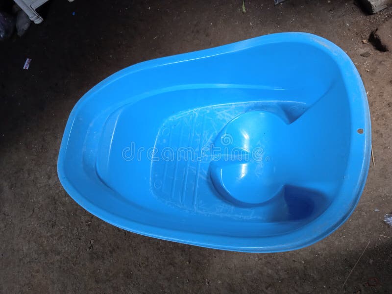 Baby blue plastic bathtub stock photo. Image of blue 246453828