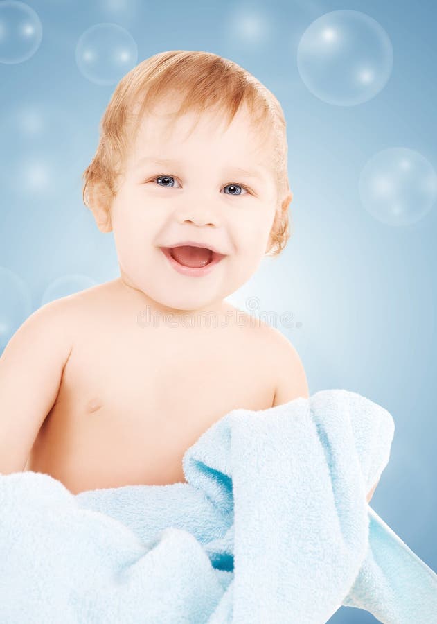 Baby with blue towel stock image. Image of baby, beautiful 38620025