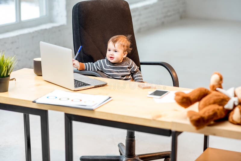 Baby boss at the office stock image. Image of documents - 106511923