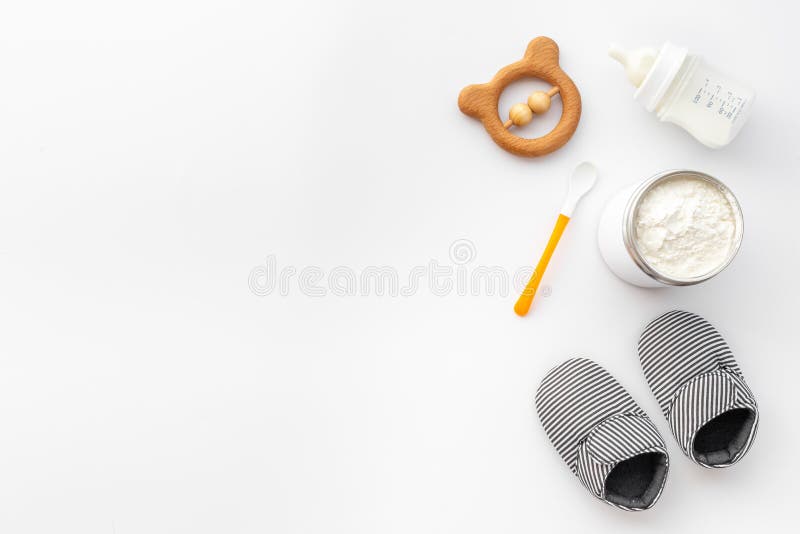 Baby Bottle Milk Formula and Powdered Milk in a Jar for Baby Feeding