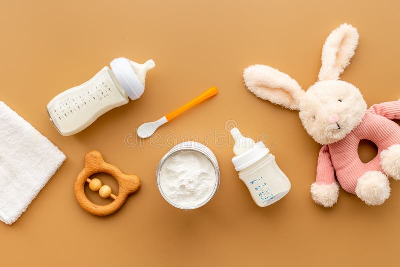 Baby Bottle Milk Formula and Powdered Milk in a Jar for Baby Feeding