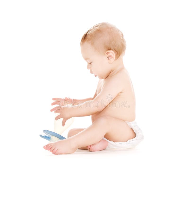 Baby boy with big pacifier stock image. Image of childcare 40522387