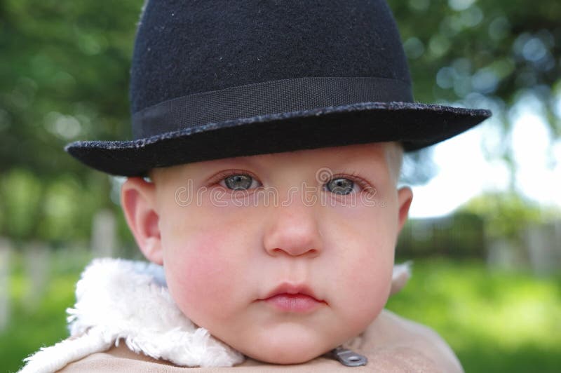Baby boy with black hat stock photo. Image of children 71086320