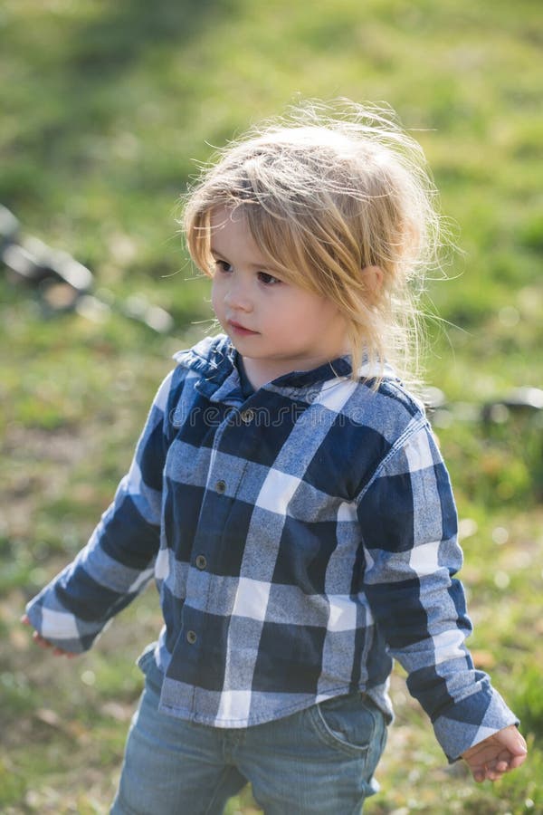 Baby Boy with Blond Hair in Plaid Blue Shirt, Jeans Stock Image - Image ...