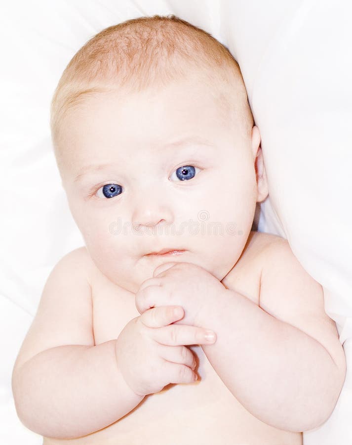 Baby Boy with Blue Eyes Looking at the Camera Stock Photo Image of