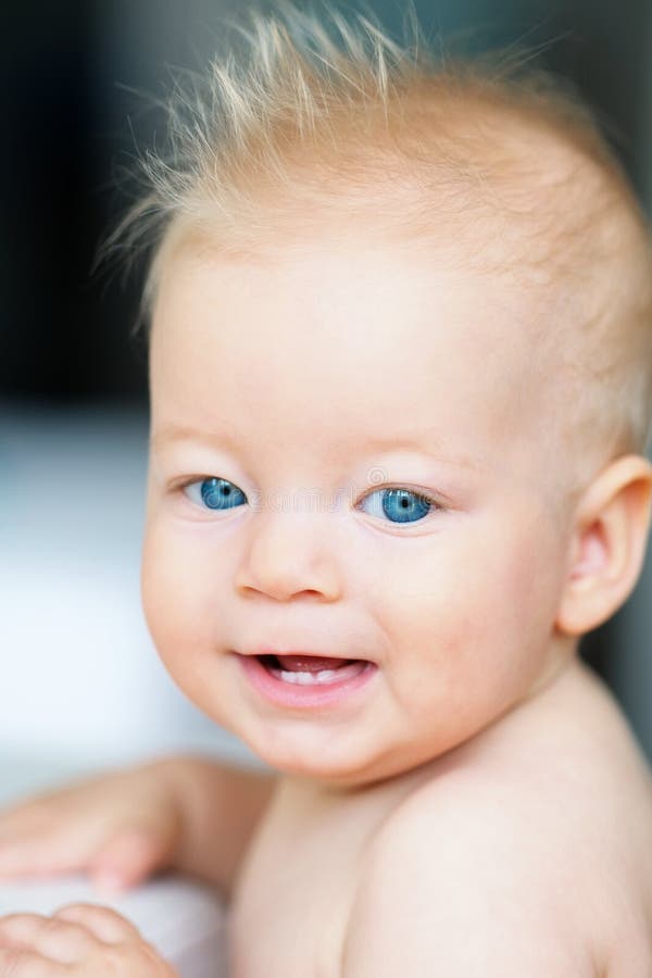 Baby boy with blue eyes stock photo. Image of home, child 90621144