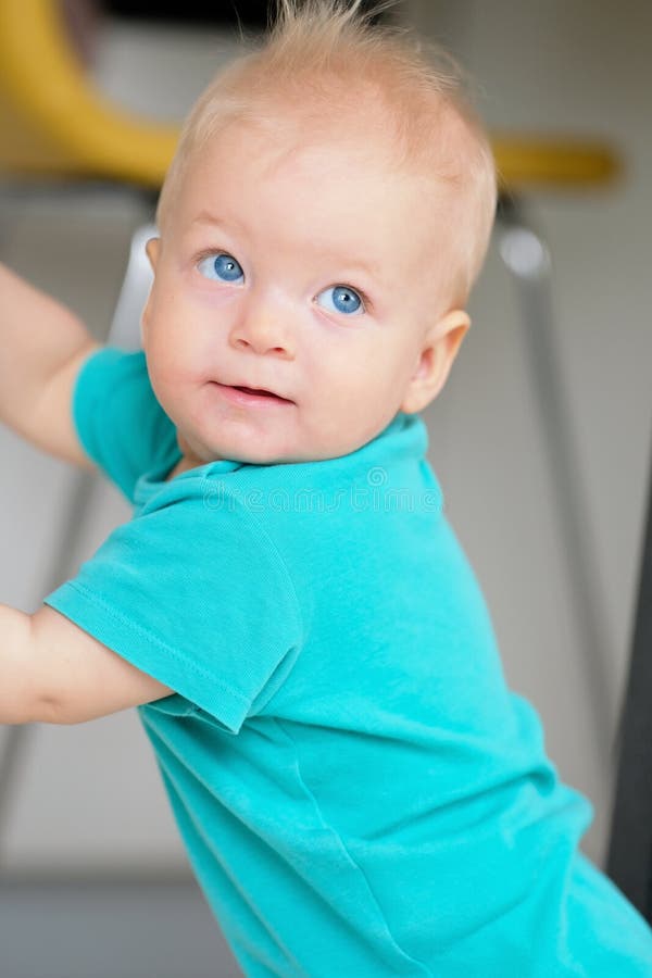 Baby boy with blue eyes stock image. Image of baby, happy 84960303