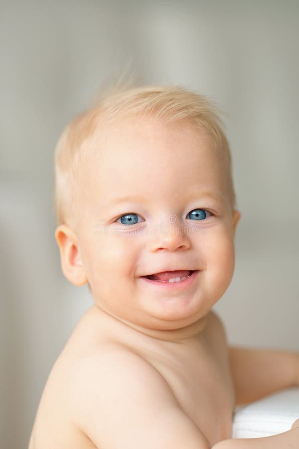 Baby boy with blue eyes stock photo. Image of innocence 85926076
