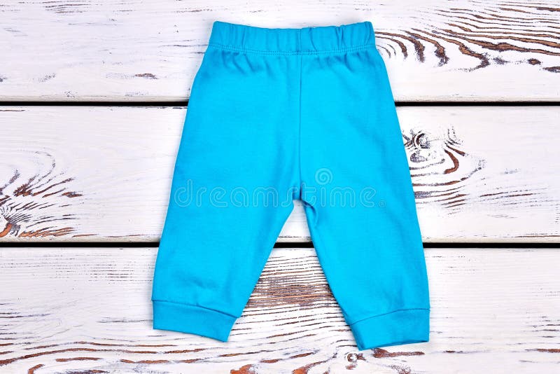 Baby boy blue trousers. stock photo. Image of business - 99639734