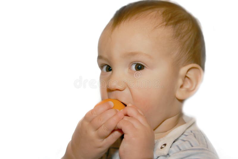 Baby Boy Eating Orange Picture. Image 3964116