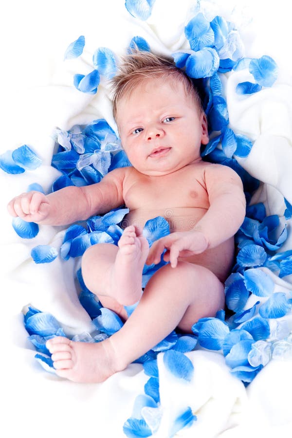 Baby boy with flowers