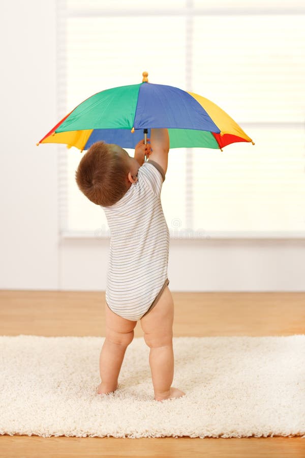 Baby with Umbrella stock image. Image of diaper, family 16241003