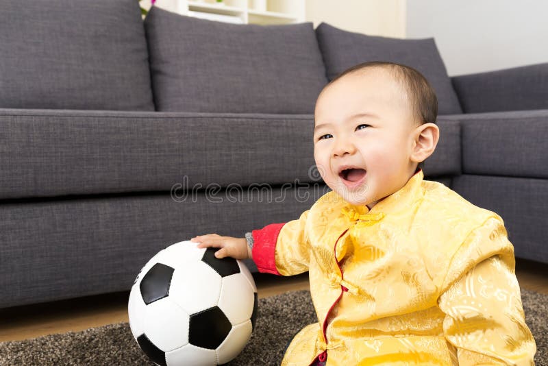 Baby boy play soccer ball stock photo. Image of sitting 39158482