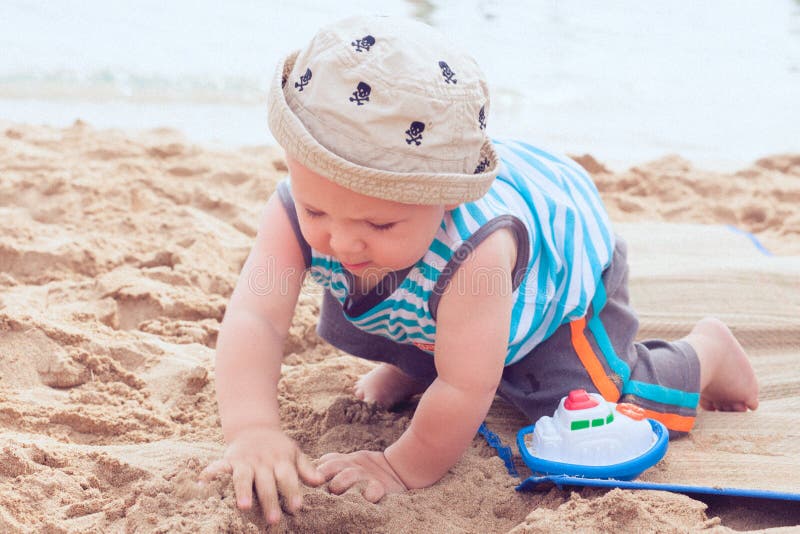 Baby Boy Playing on the Beach Stock Image Image of holiday, infant