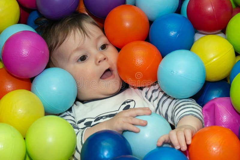 The Baby Boy is Playing with Color Balls Stock Photo Image of