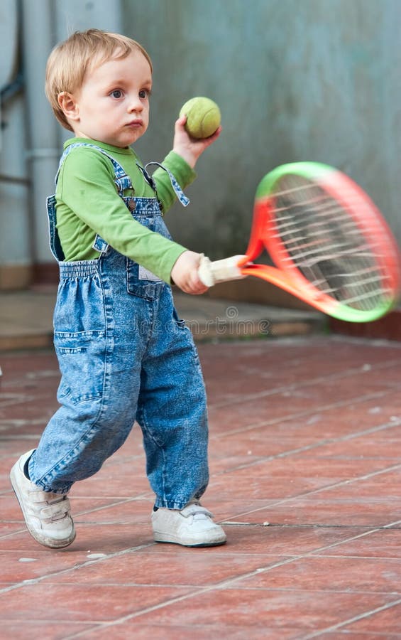 Baby boy playing tennis stock photo. Image of baby, toddler 24575216