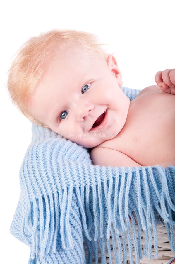 Baby boy s portrait on blue blanket