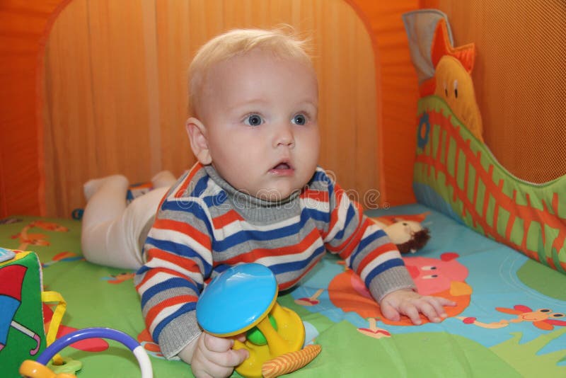 Baby Boy Sitting in the Orange Playpen Stock Image Image of baby