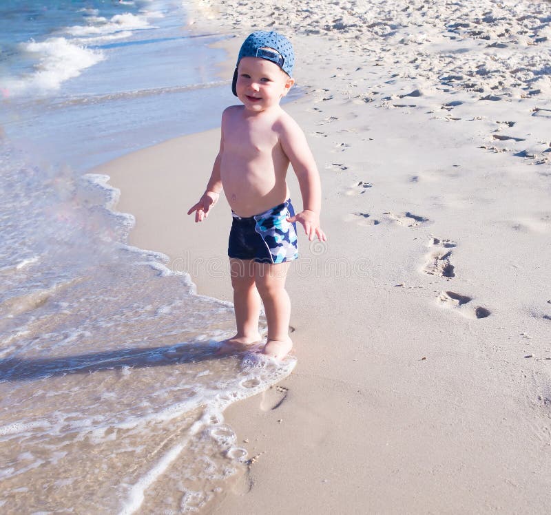 Baby Boy Standing on Beach, Sand. Resort Stock Photo Image of playful