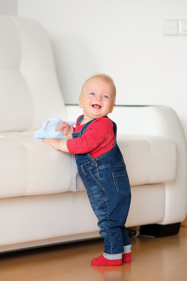 Baby boy standing stock image. Image of child, people - 77067941