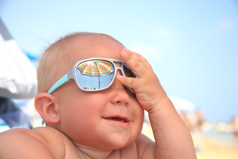 Baby boy with sunglasses stock photo. Image of sand, copyspace 51863396