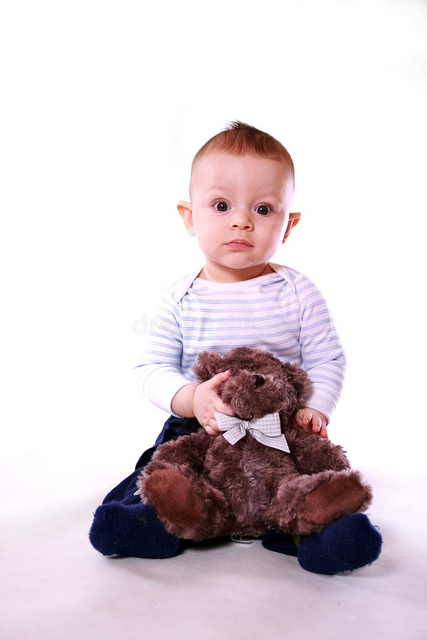 Baby boy with teddy bear stock image. Image of beautiful 18912767