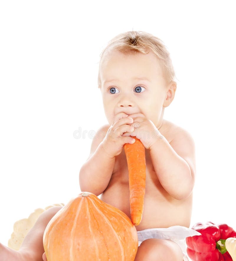 Baby boy with vegetables stock image. Image of human 13732267