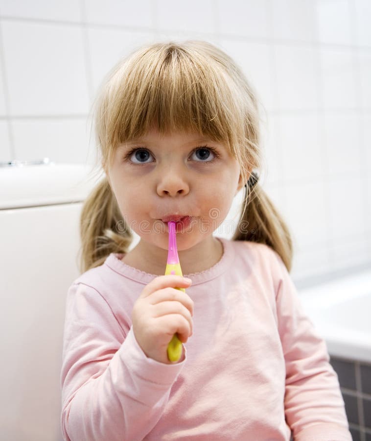 Baby Brushing teeth stock photo. Image of enjoyment, toothbrush 27178712