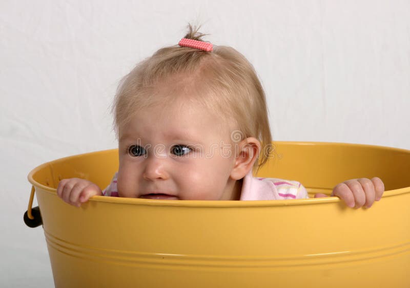 Baby in a bucket stock image. Image of family, infant, babies 339793