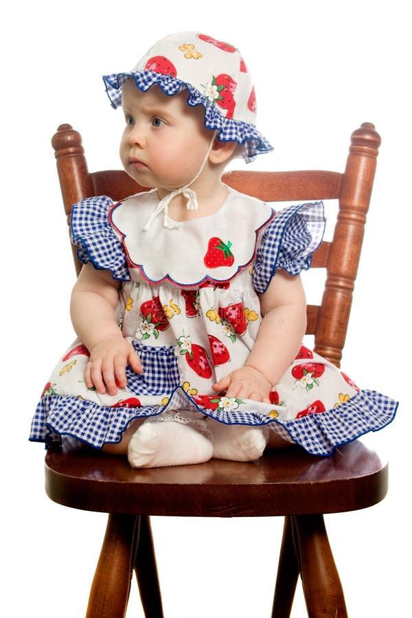 Baby on chair. stock photo. Image of infant, bonnet, caucasian - 3871452
