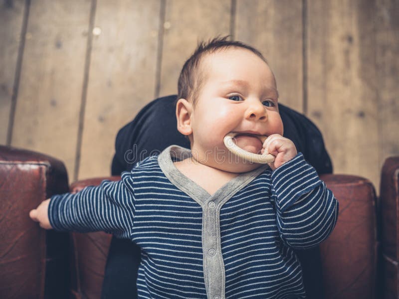 Baby Chewing on Teething Ring Stock Photo Image of child, teething