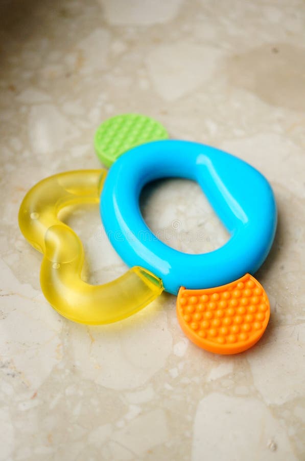 Baby chewing toy stock image. Image of object, baby, orange 42030703