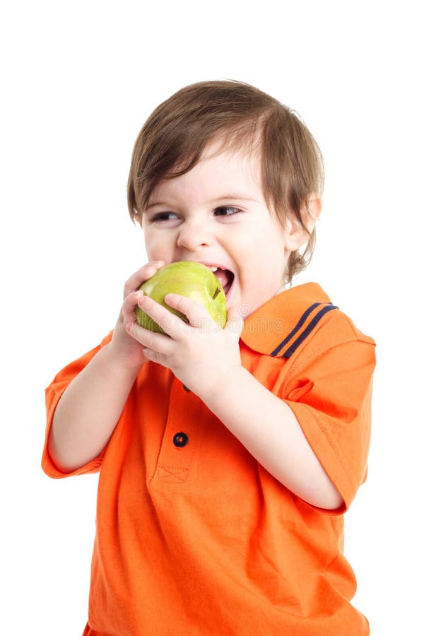 Baby child eating an apple