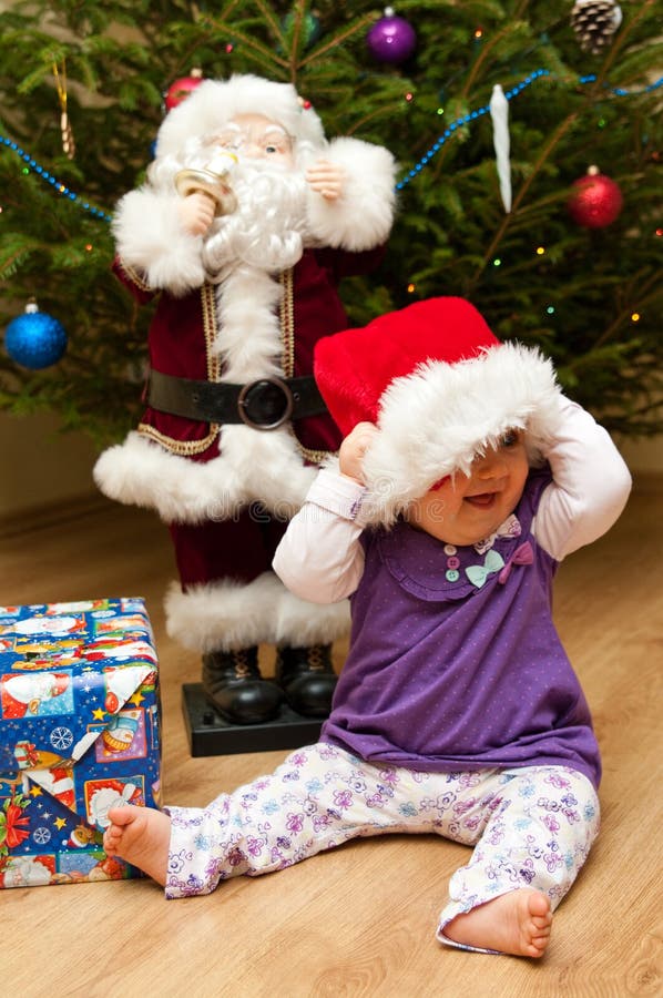 Baby Christmas tree stock image. Image of sits, santa 17628577