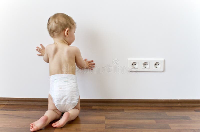 Baby close to electric outlets