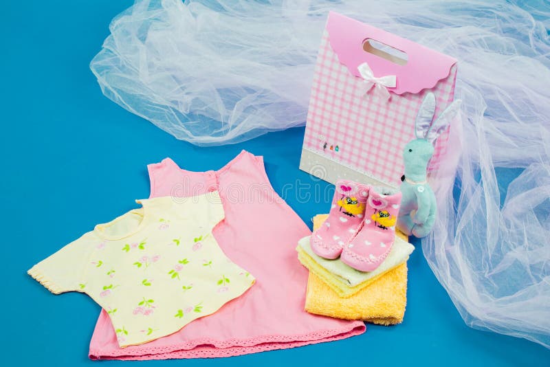 The Baby Clothes with a Gift Box Stock Image Image of boots, baby