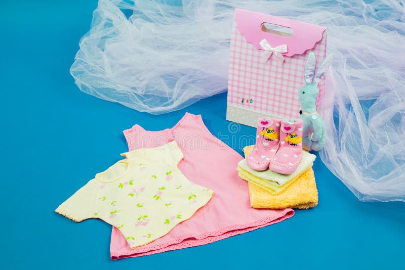The Baby Clothes with a Gift Box Stock Image Image of boots, baby