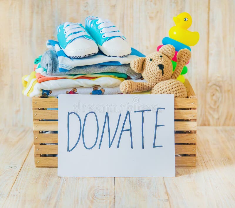 Baby Clothing And Donation Accessories. Selective Focus