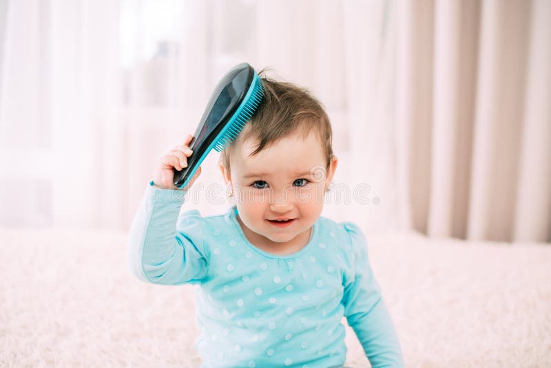 Baby with a Comb a Little Girl with a Blue Comb Comb Combs Her Hair Stock Image - Image of brown, combing: 146486197 Baby with a Comb a Little Girl with a Blue Comb Comb Combs Her Hair Stock Image - Image of brown, combing: 146486197